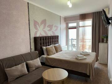 двухкомнатный люкс с балконом в Гостинице Белый лев