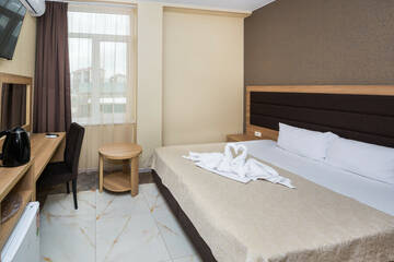 двухкомнатный люкс с балконом в Гостинице Белый лев