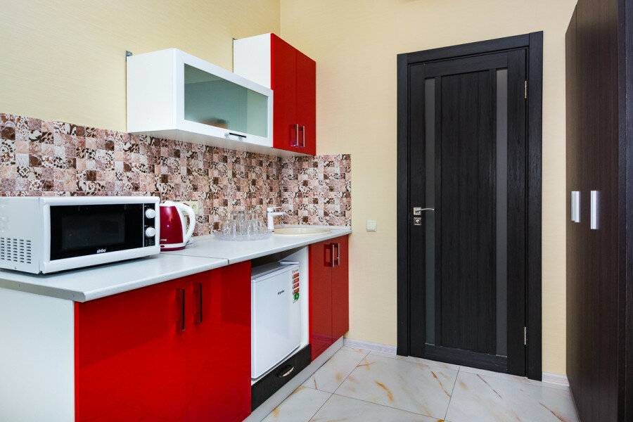 Фотографии номера апартаменты с двумя спальнями  и  балконом на море в Гостинице Белый лев Судак