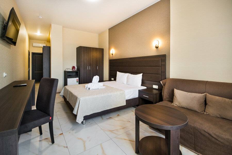 Фотографии номера двухкомнатный люкс с балконом в Гостинице Белый лев Судак