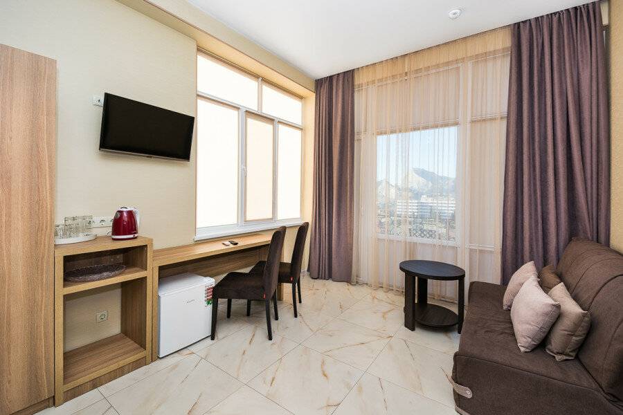 Фотографии номера двухкомнатный люкс с балконом в Гостинице Белый лев Судак