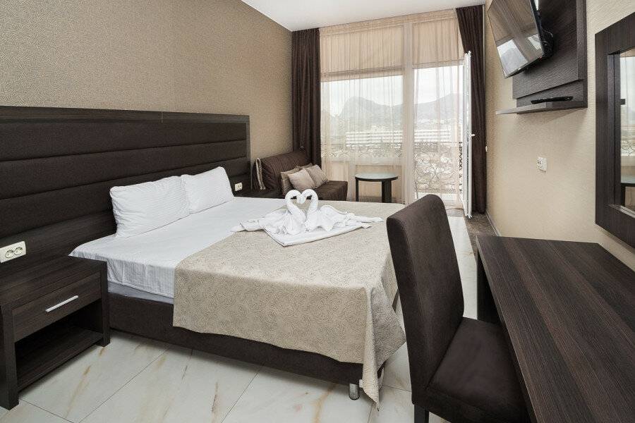 Фотографии номера двухкомнатный люкс с балконом в Гостинице Белый лев Судак